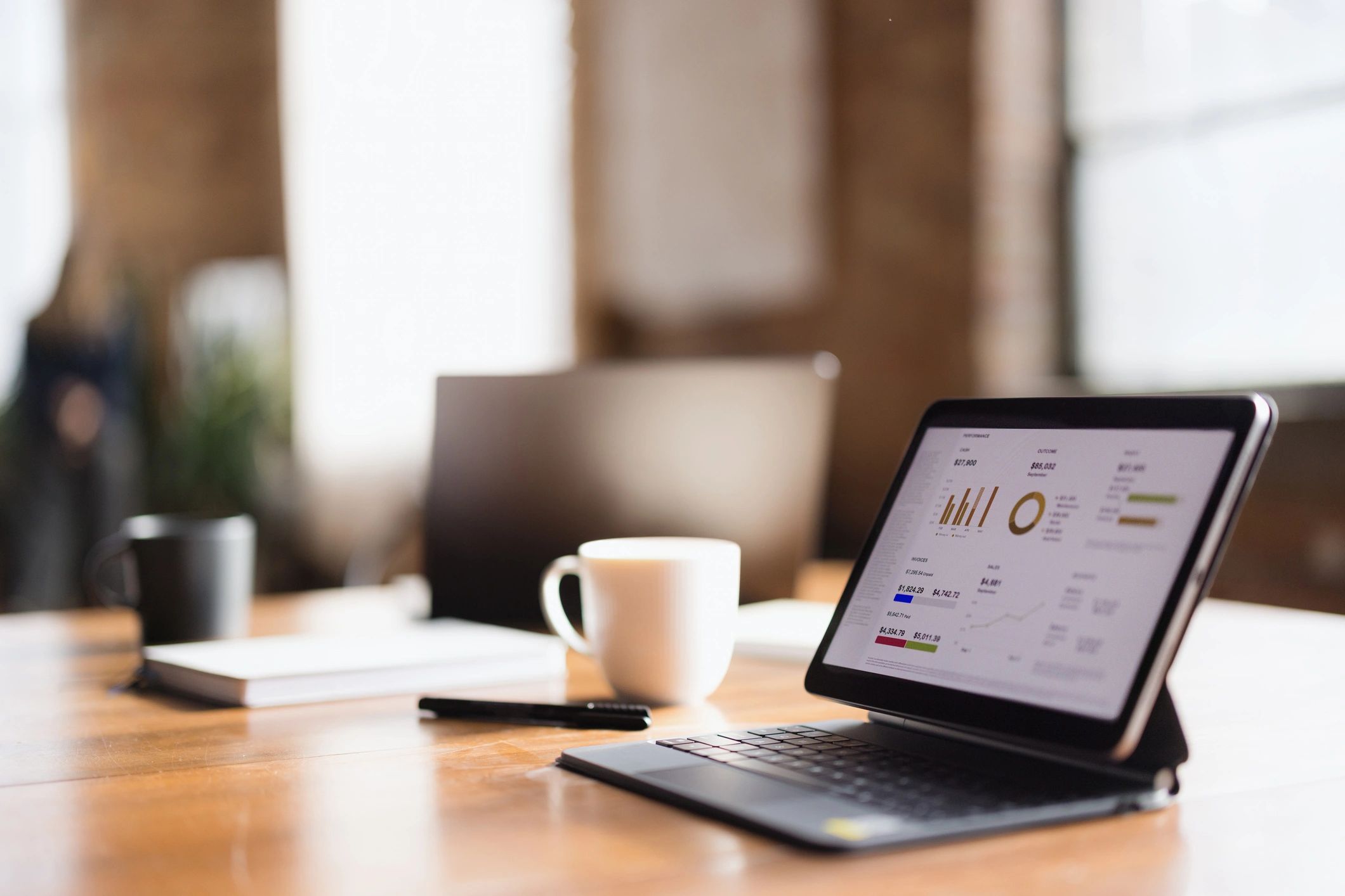 Business analytics dashboard on a tablet representing reporting and analysis